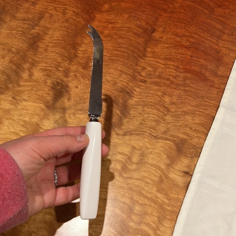 Set of 12 Sheffield England Curved Tip Knife Knives White Ceramic Handle